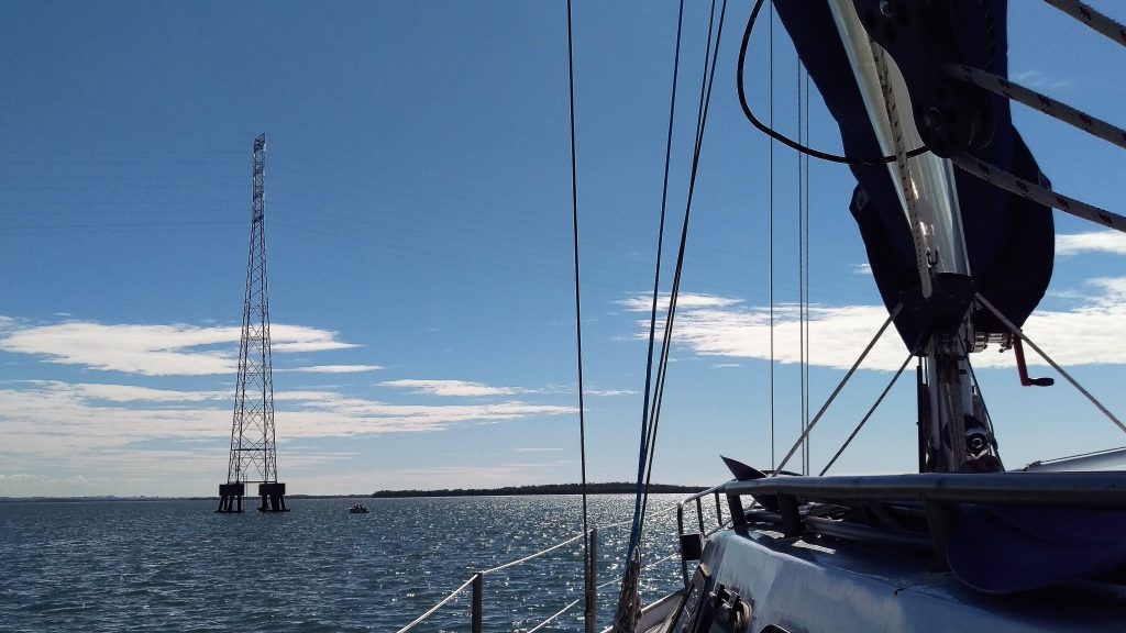 First time sailing under electricity pylons and wires. Between Russel Island and the mainland. 15 July 2017.