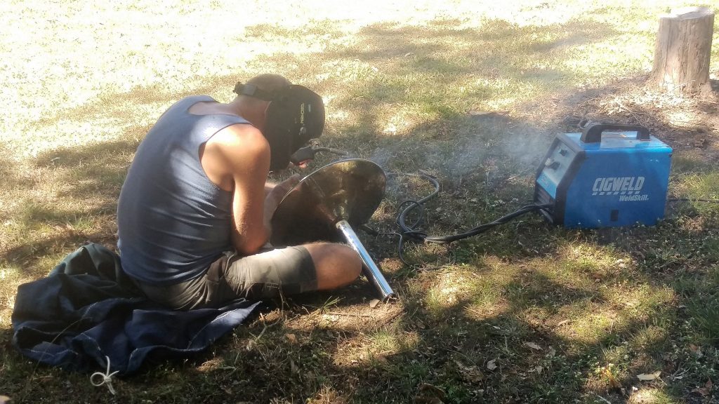 Simon welding up the base of the captains chair. No more wobbly chair! August 2017