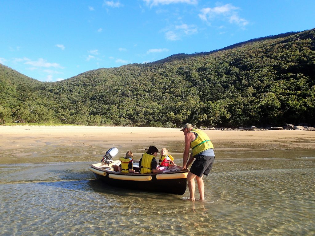 Heading back home in the dinghy after an afternoon exploring the beach at Scawfell Island. August 2017